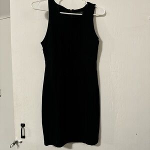 Black bodycon dress with a zipper on the back
